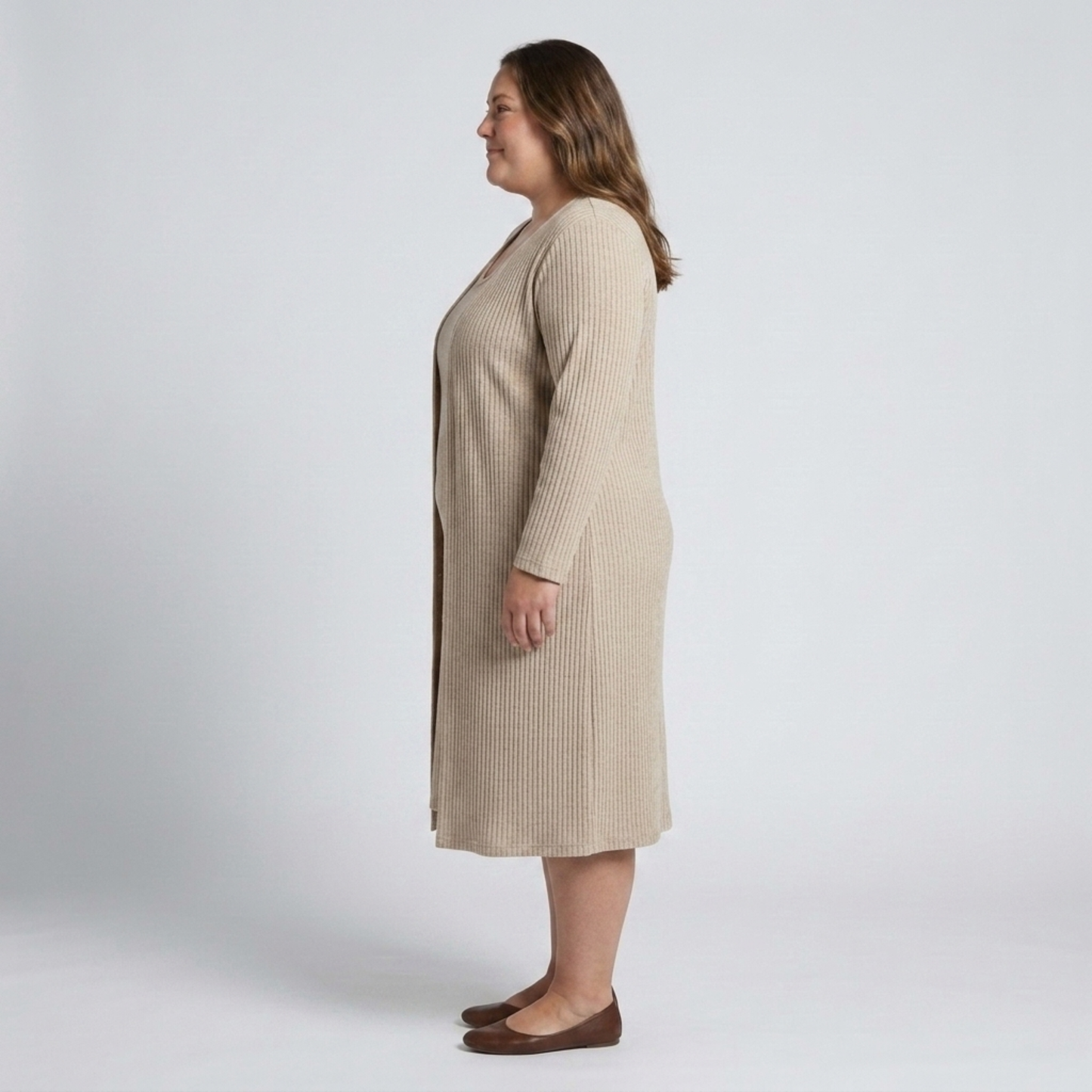 Plus size sleeveless dress and matching long vest in textured knit
