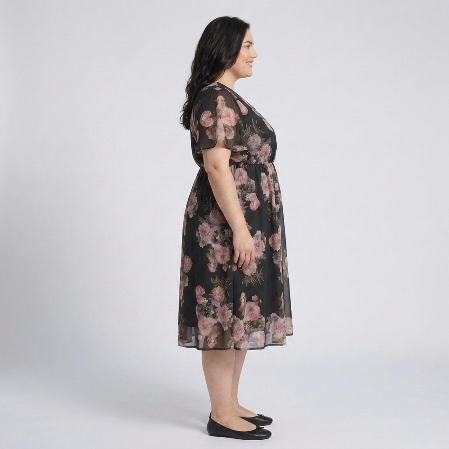 Plus size mid-length dress for women with a crossover collar and butterfly sleeves
