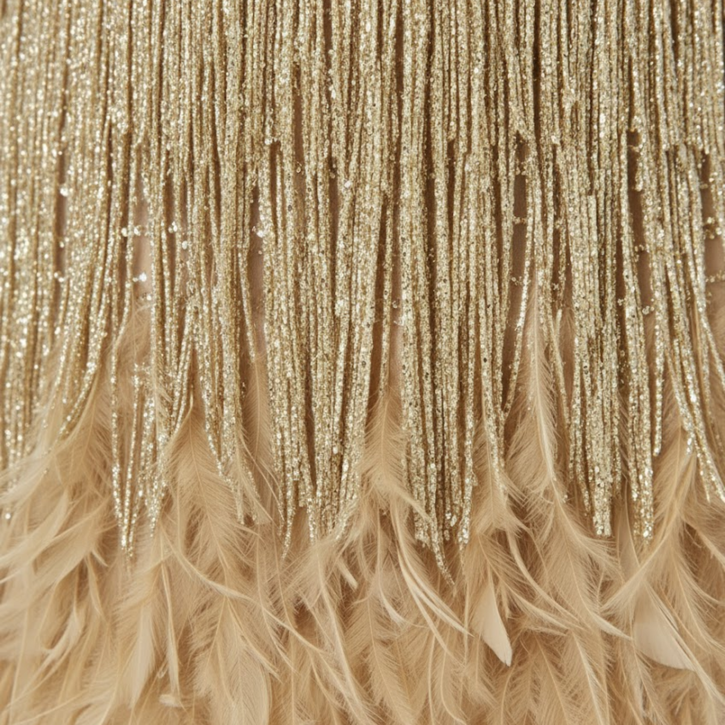 Evening gown with sequins and feathers, V-neckline, and thin straps