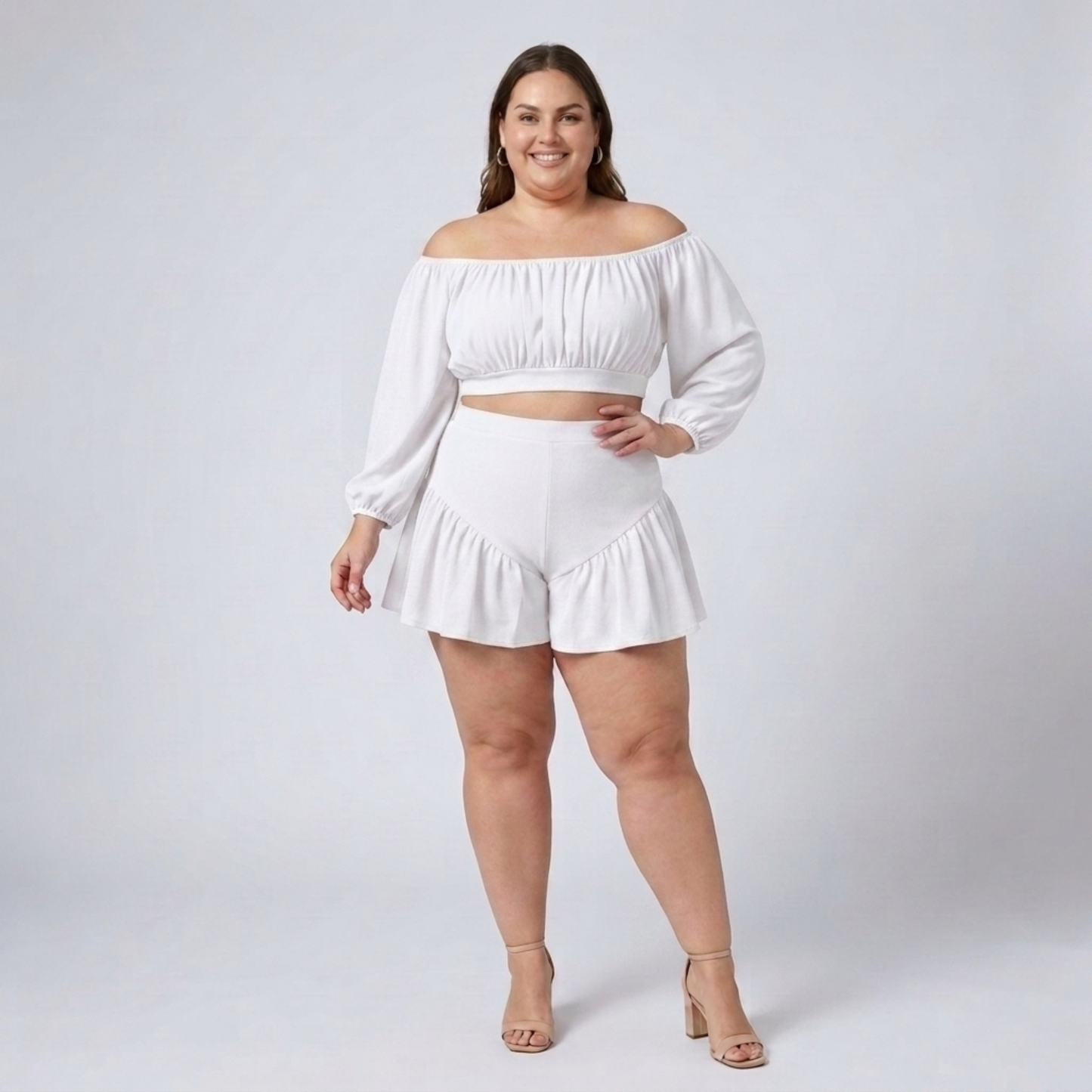 Plus size off-shoulder top and ruffled shorts set