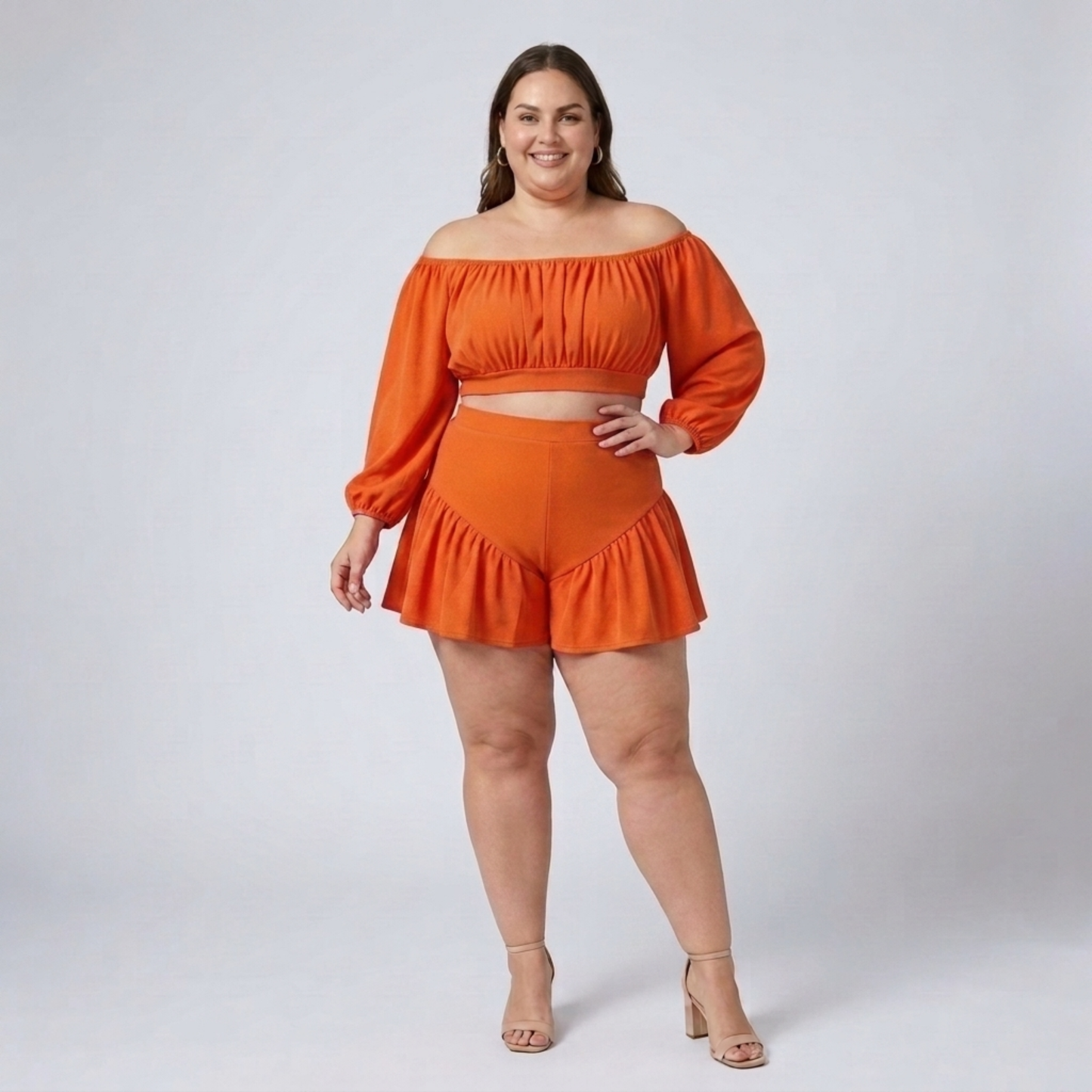 Plus size off-shoulder top and ruffled shorts set